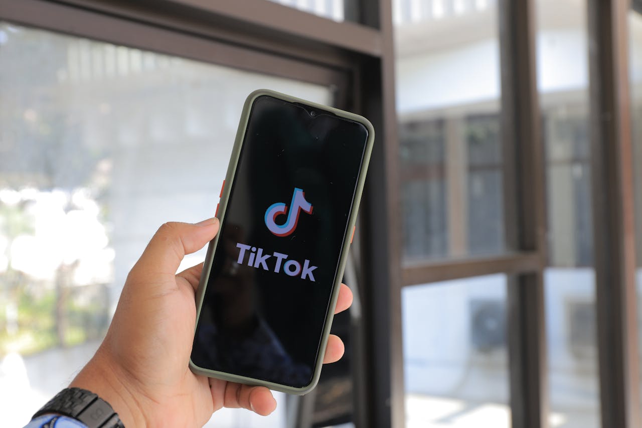 TikTok App on Mobile Phone - Photo by "GreenWish _" on Pexels